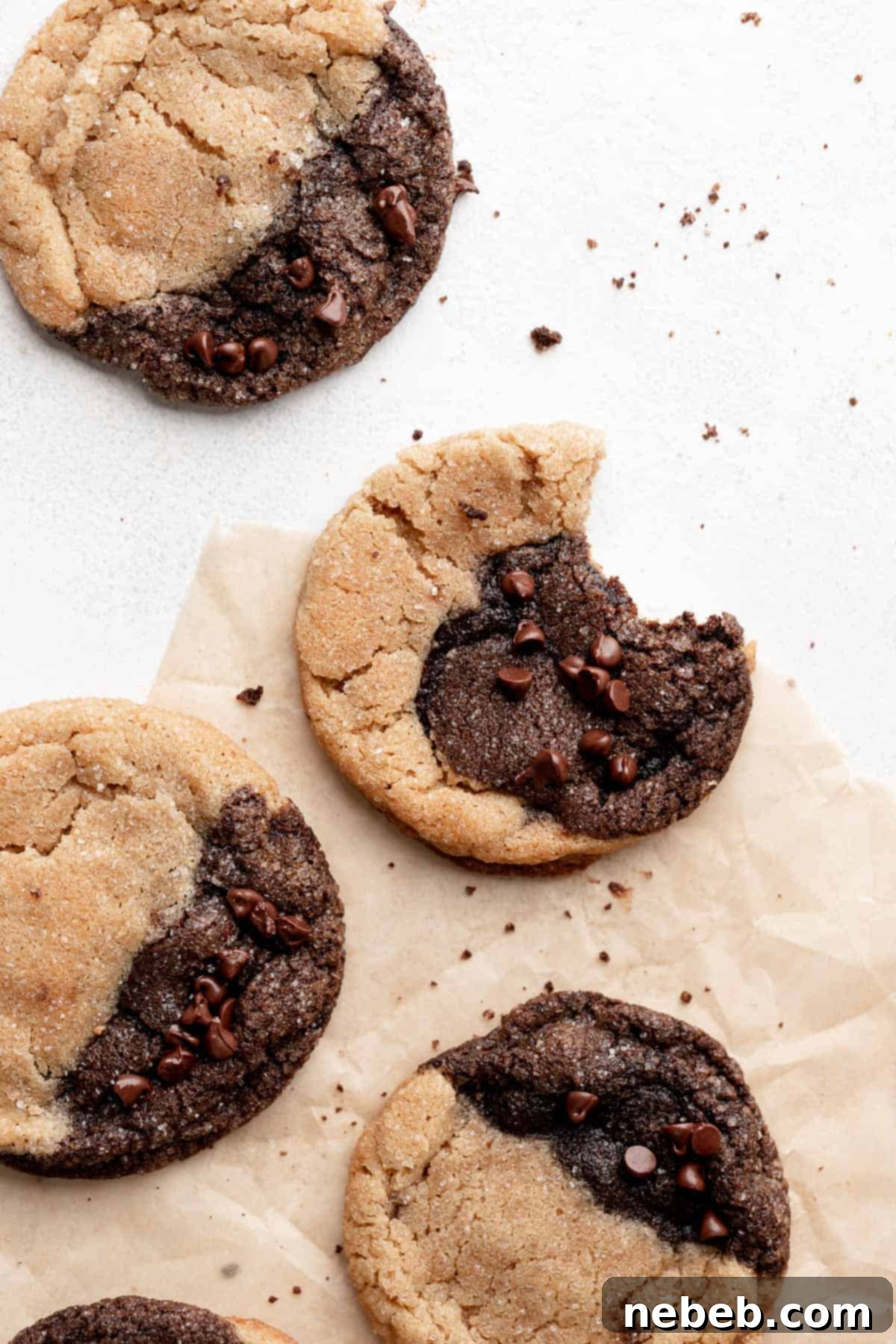 chocolate peanut butter marbled cookies on parchment.
