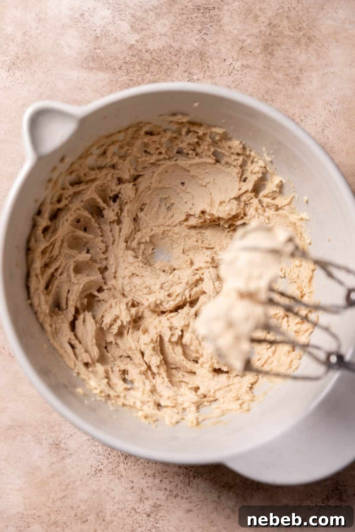 Creamed butter and sugar in a mixing bowl, light and fluffy.