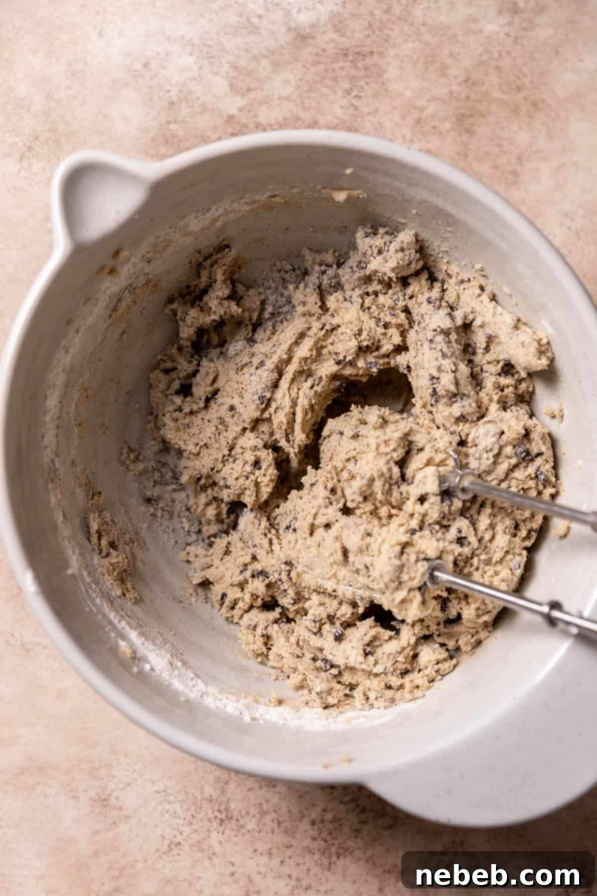 Oreo cookie dough in a mixing bowl, ready for filling.