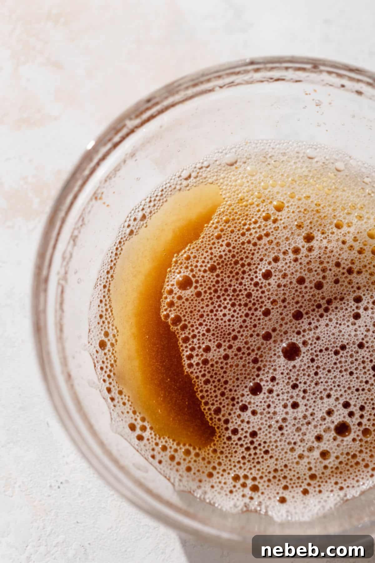 a glass bowl of brown butter.