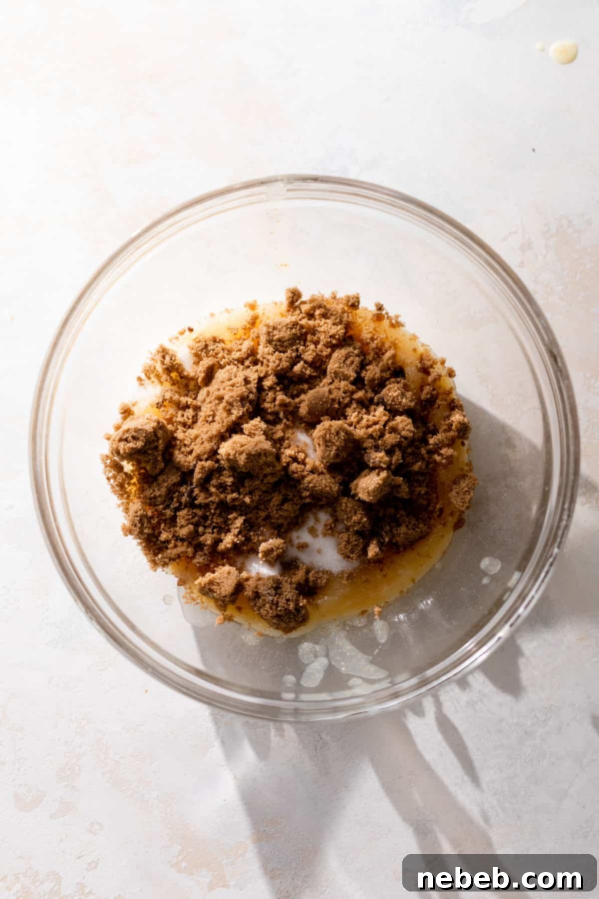 Spiced Pumpkin Snickerdoodle Delights 6 A bowl of brown butter and sugar before whisking together.