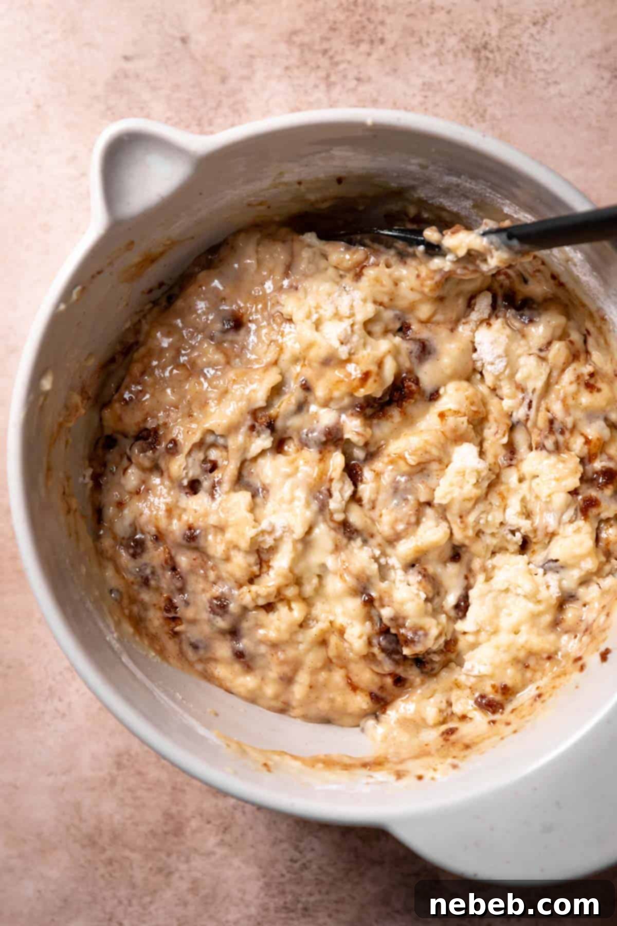 A mixing bowl with the cinnamon swirled muffin batter.