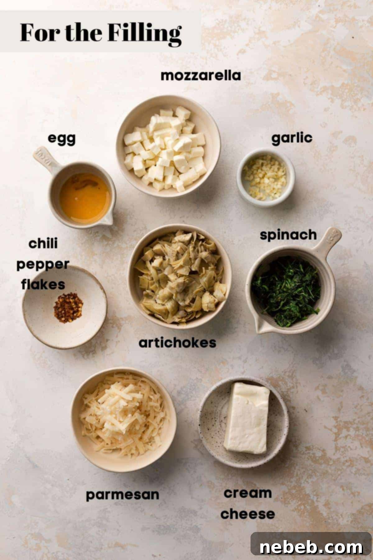 Creamy Spinach Artichoke Stuffed Pretzels 5 ingredients needed to make the spinach artichoke filling.
