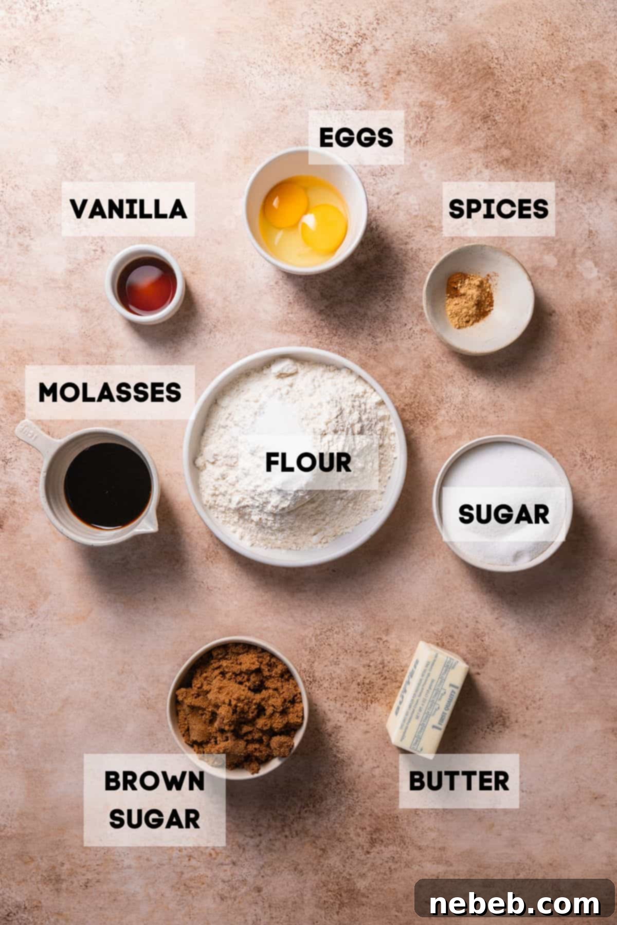 Ingredients needed to make molasses cookies, laid out in individual bowls with labels for clarity.