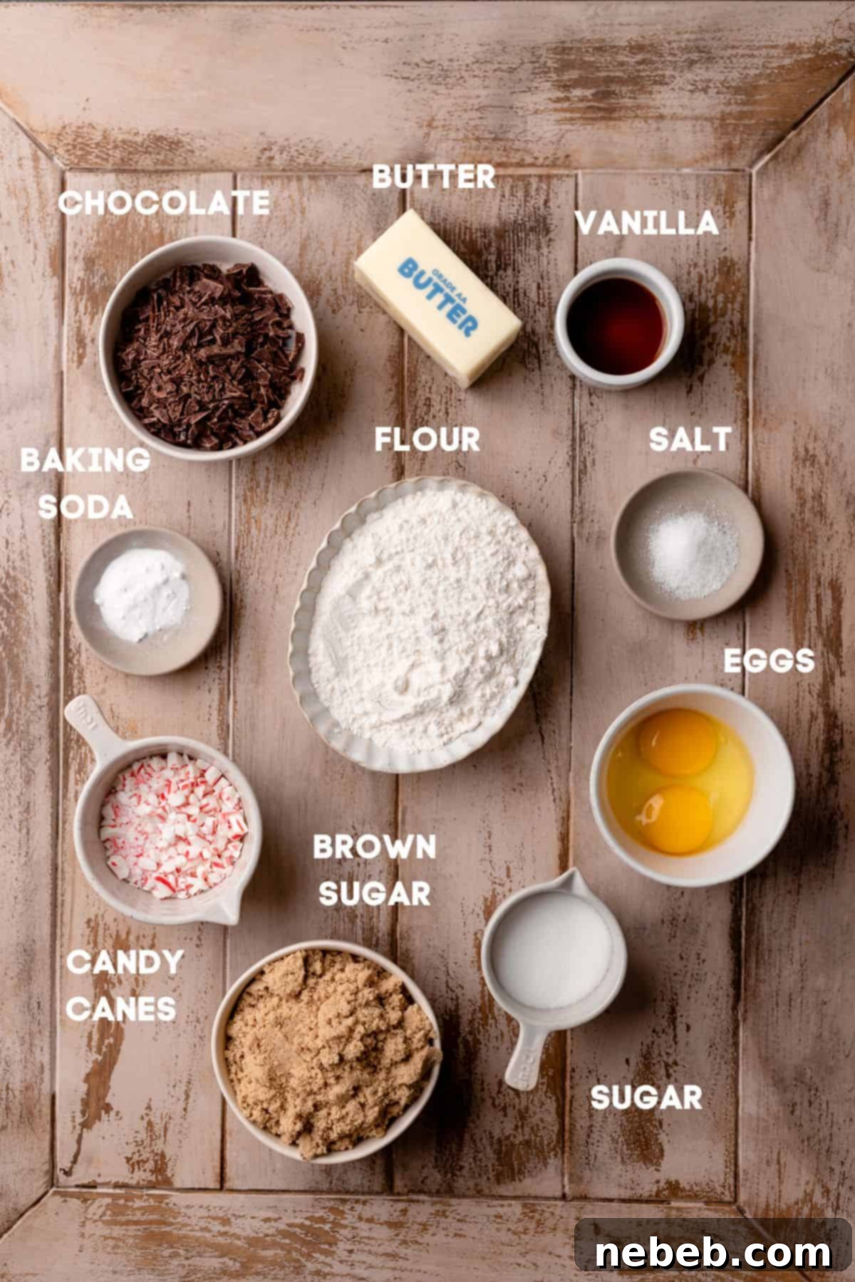 bowls of ingredients for peppermint chocolate chip cookies, including butter, sugars, flour, chocolate chips, and crushed candy canes.