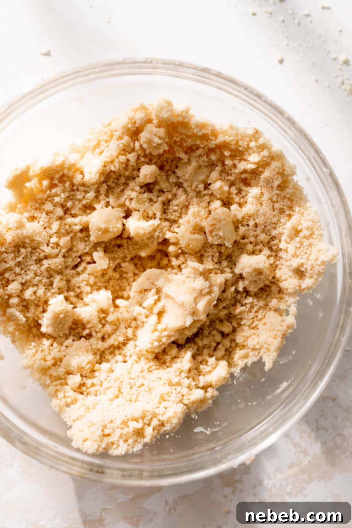 a glass bowl with the shortbread crumbs.