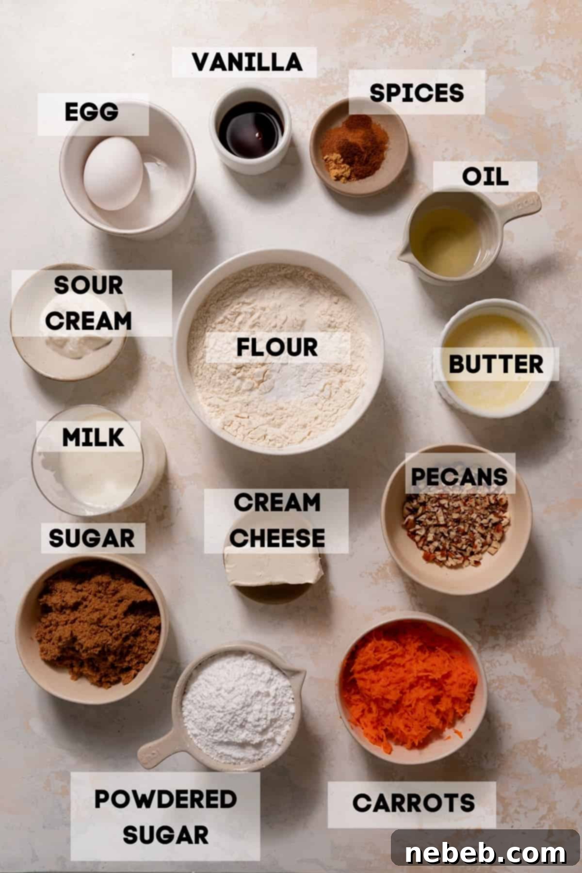 A flat lay of all the ingredients needed to make moist and spiced baked carrot donuts, including fresh carrots, spices, and wet ingredients.