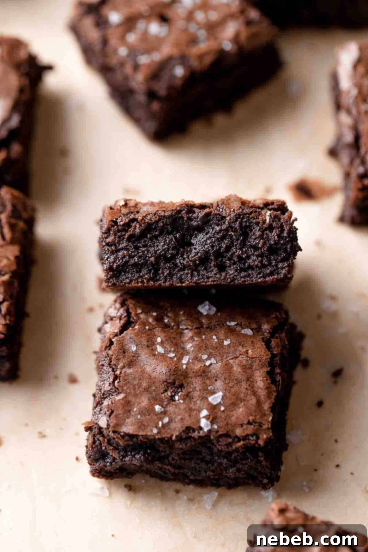 A few coffee brownies neatly arranged on parchment paper.