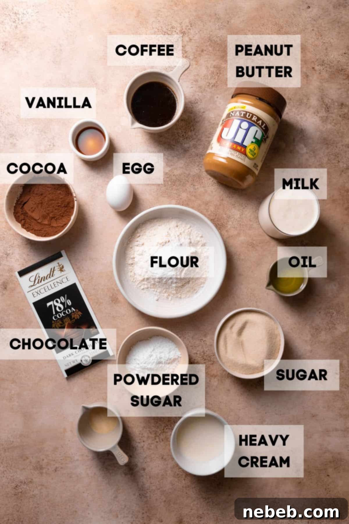 Various ingredients for Reese's cake laid out in bowls with labels, ready for baking.