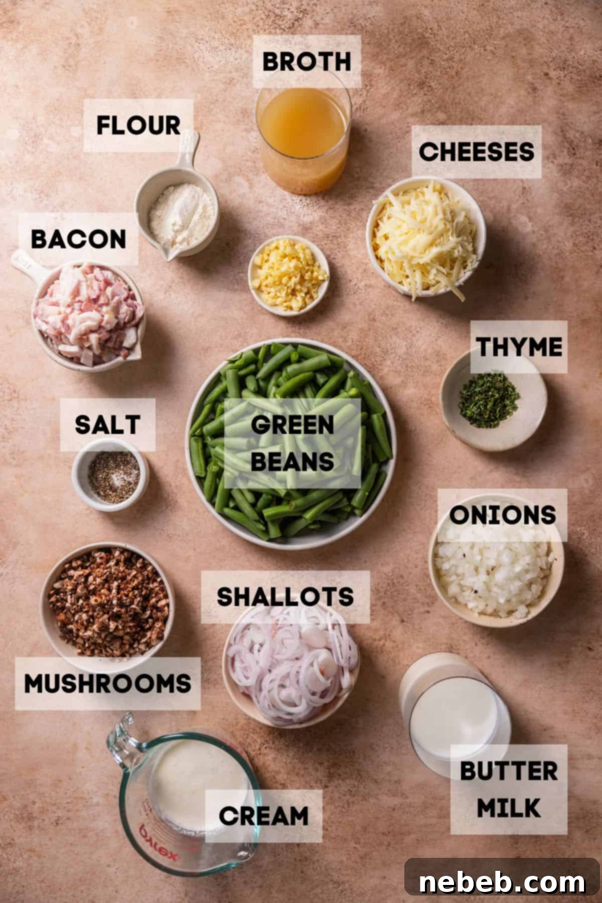 Fresh ingredients laid out for homemade cheesy green bean casserole, including green beans, mushrooms, and various cheeses.