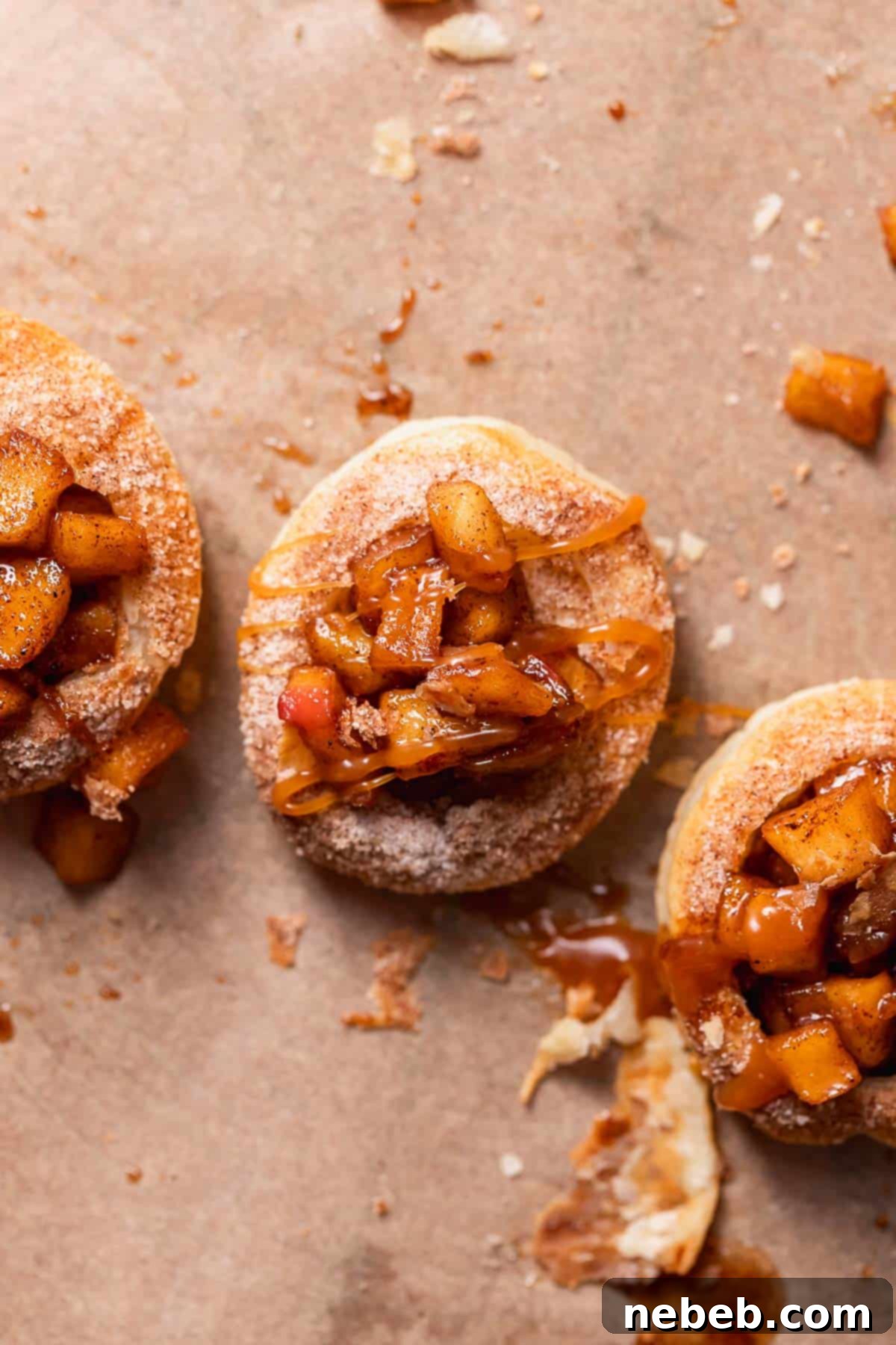 Apple pie cookies with caramel drizzled on top.