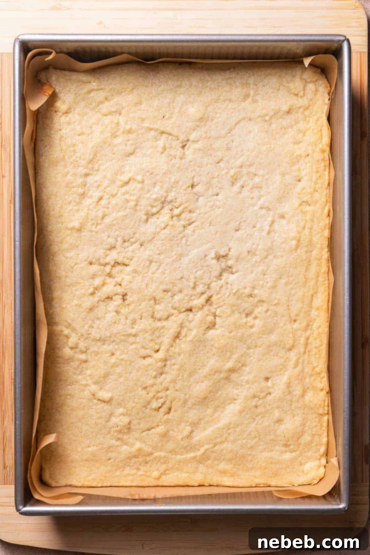 The baked sugar cookie bars in a baking pan.