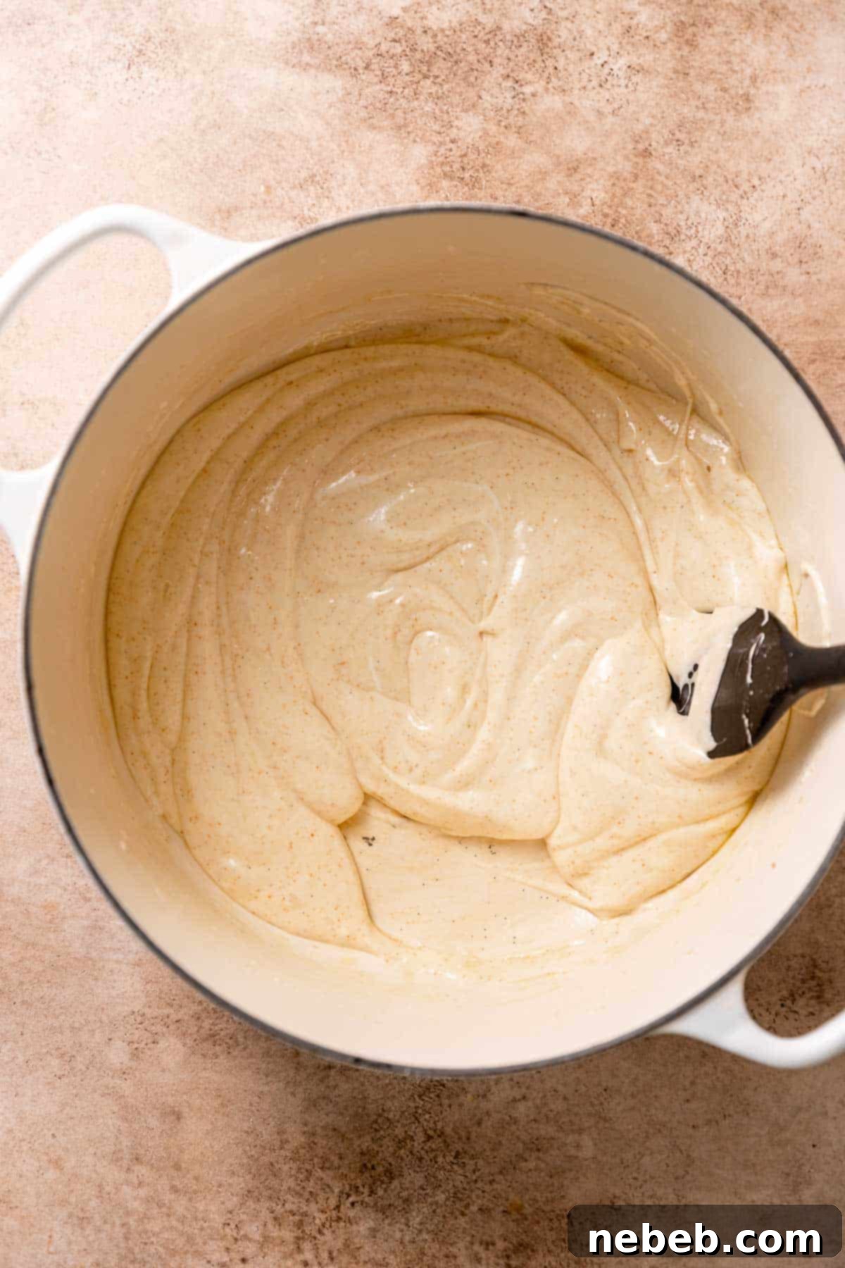 A dutch oven with the melted marshmallows mixed with the melted brown butter.