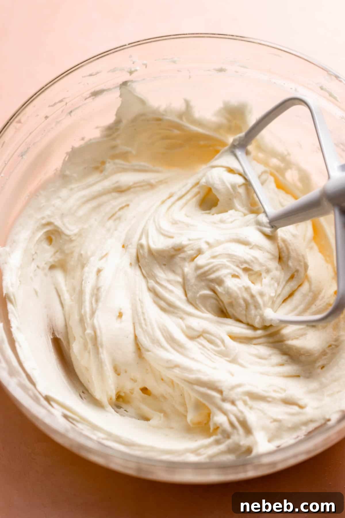 The finished cream cheese buttercream frosting in a bowl.