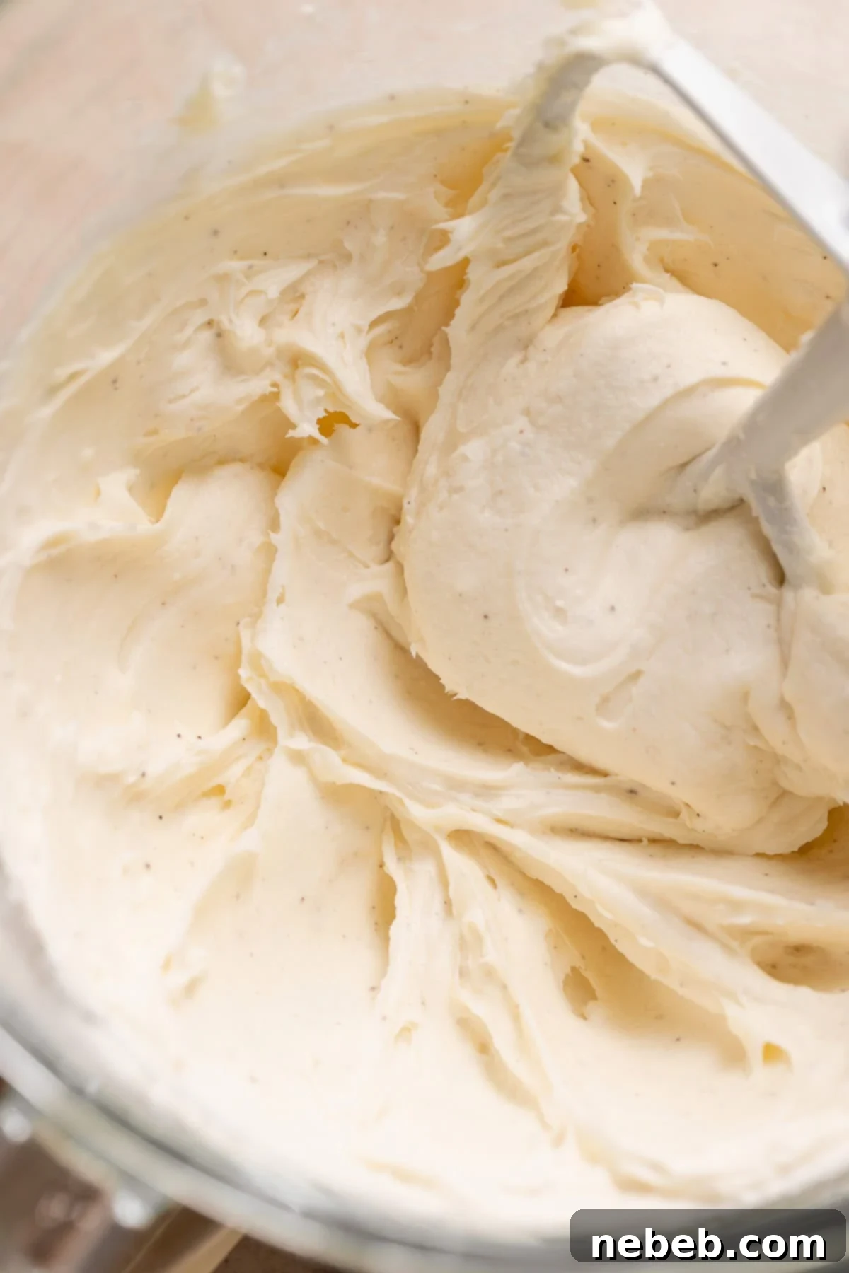 Cream cheese frosting in a mixing bowl.