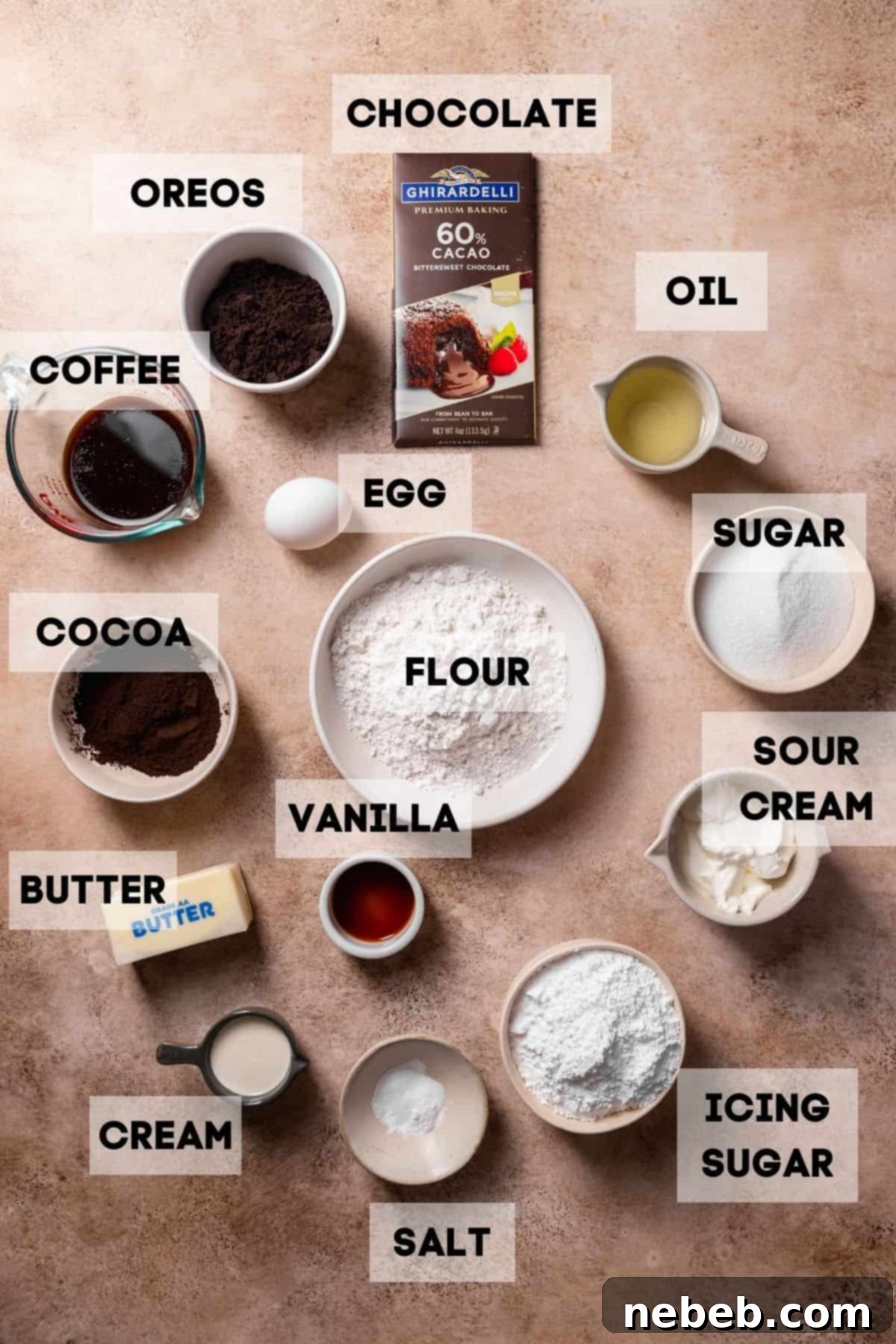 Bowls of ingredients for Oreo cupcakes, neatly labeled and arranged.