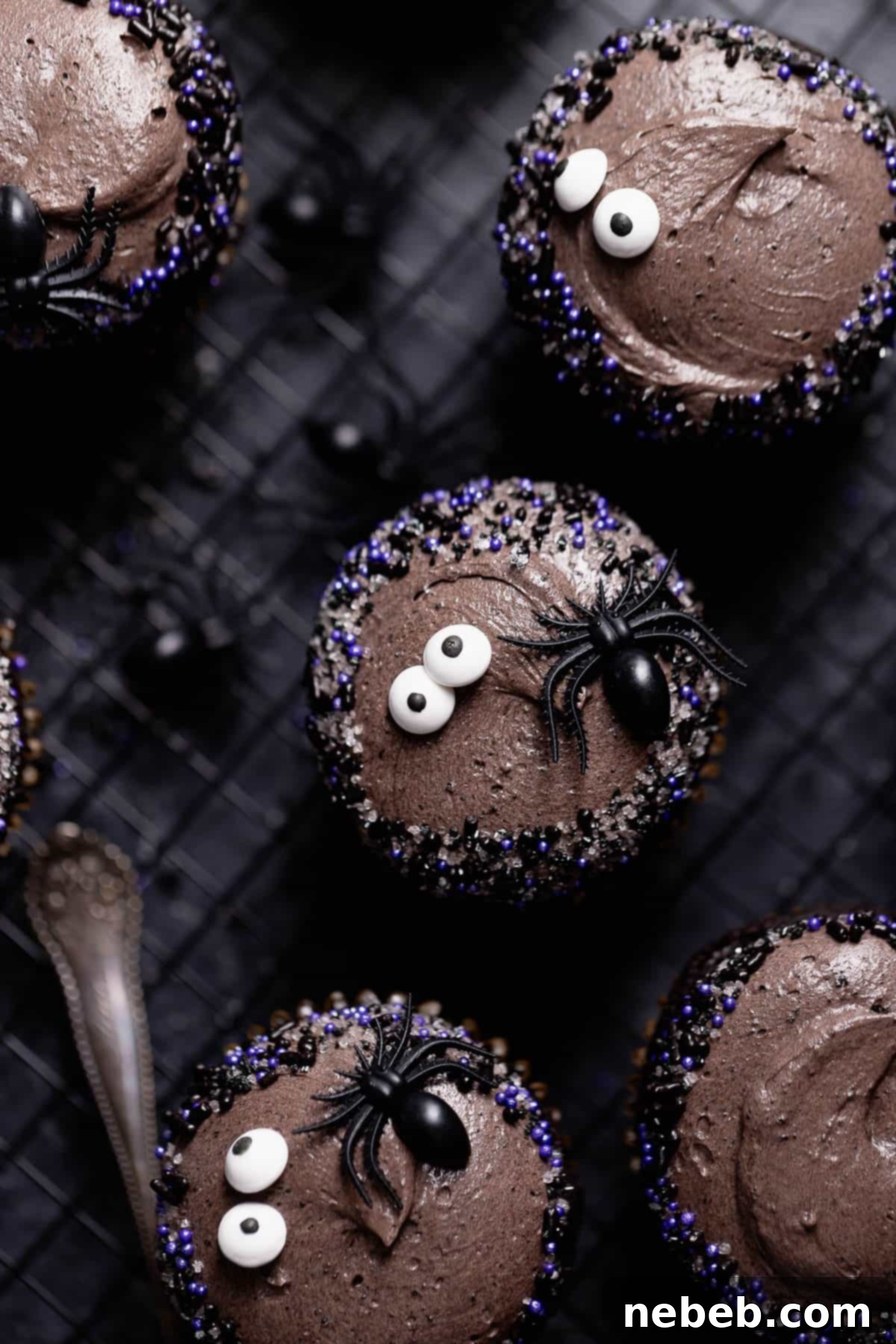 An overhead shot of the black velvet cupcakes decorated with candy eyeball sprinkles.
