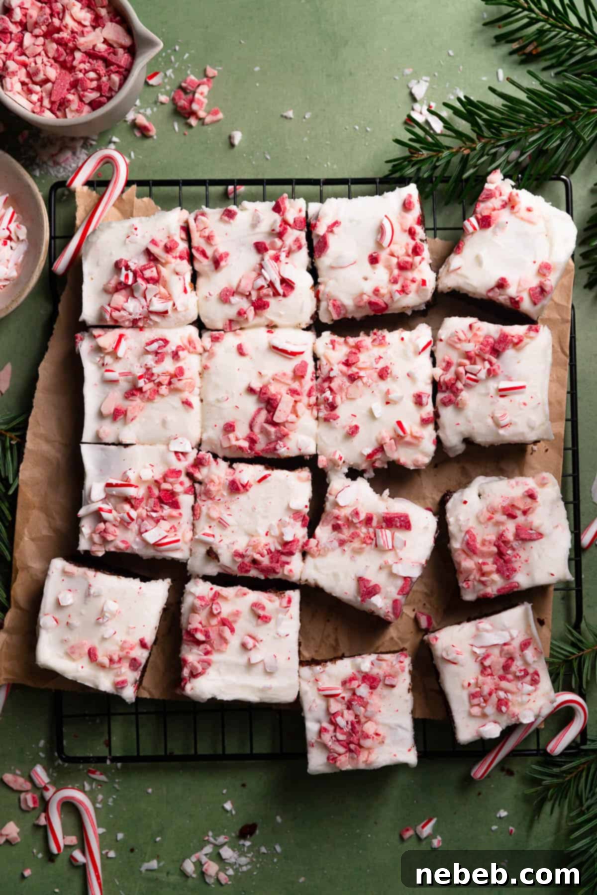 Cool Mint Chocolate Brownies 2 Peppermint brownies with crushed candy canes cut into perfect squares, showcasing their fudgy texture and festive topping.