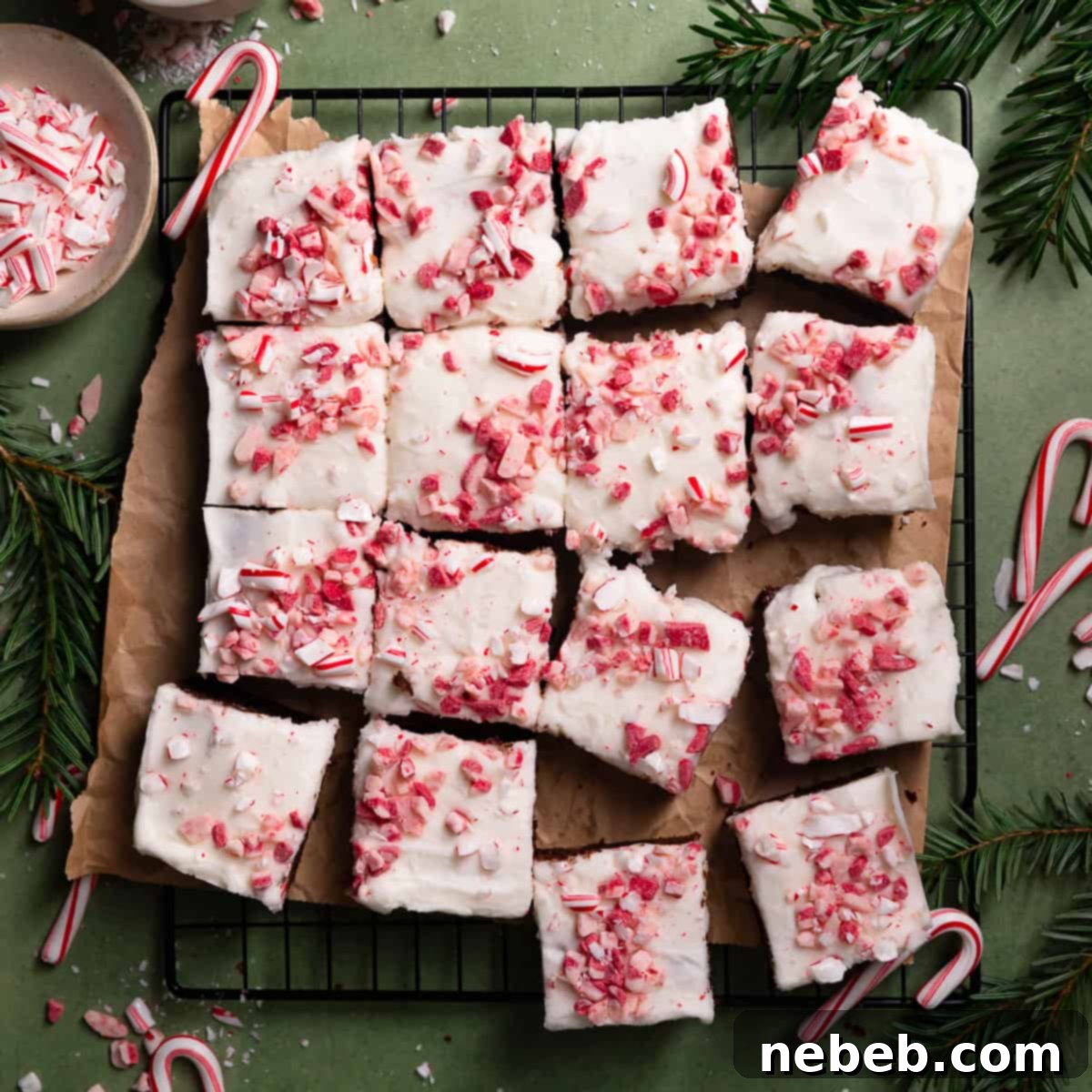 Cool Mint Chocolate Brownies 11 Delicious square peppermint brownies with a thick layer of white frosting and crushed candy canes on top.