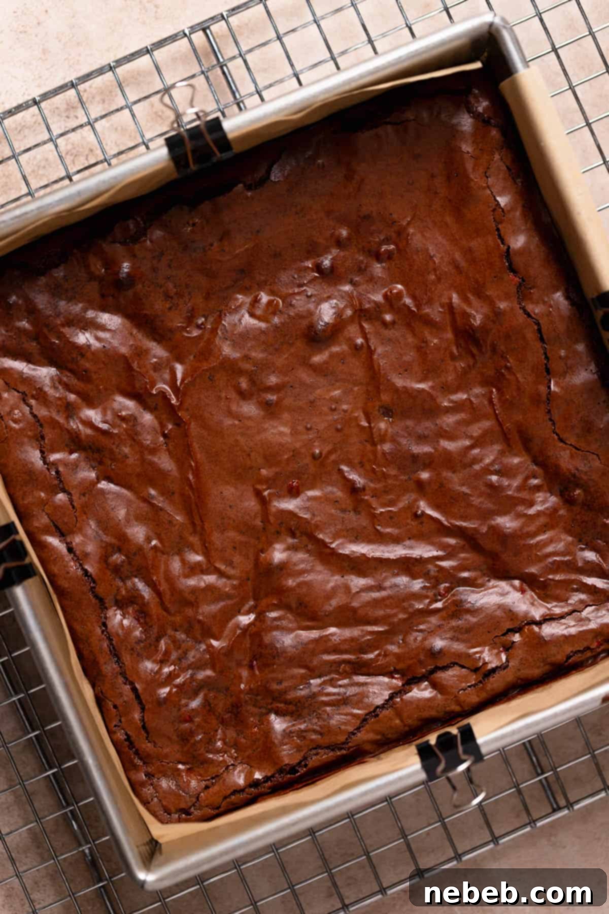 Cool Mint Chocolate Brownies 7 Baked brownies in a pan, resting on a wire rack to cool completely before frosting.