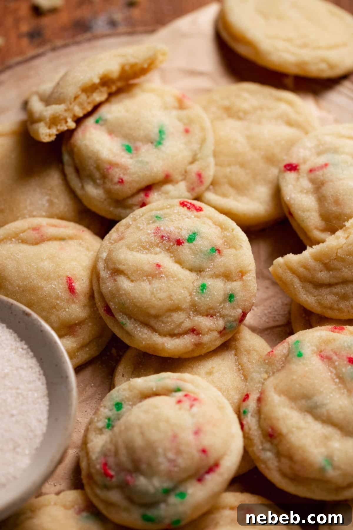 Sugar cookies in a pile.
