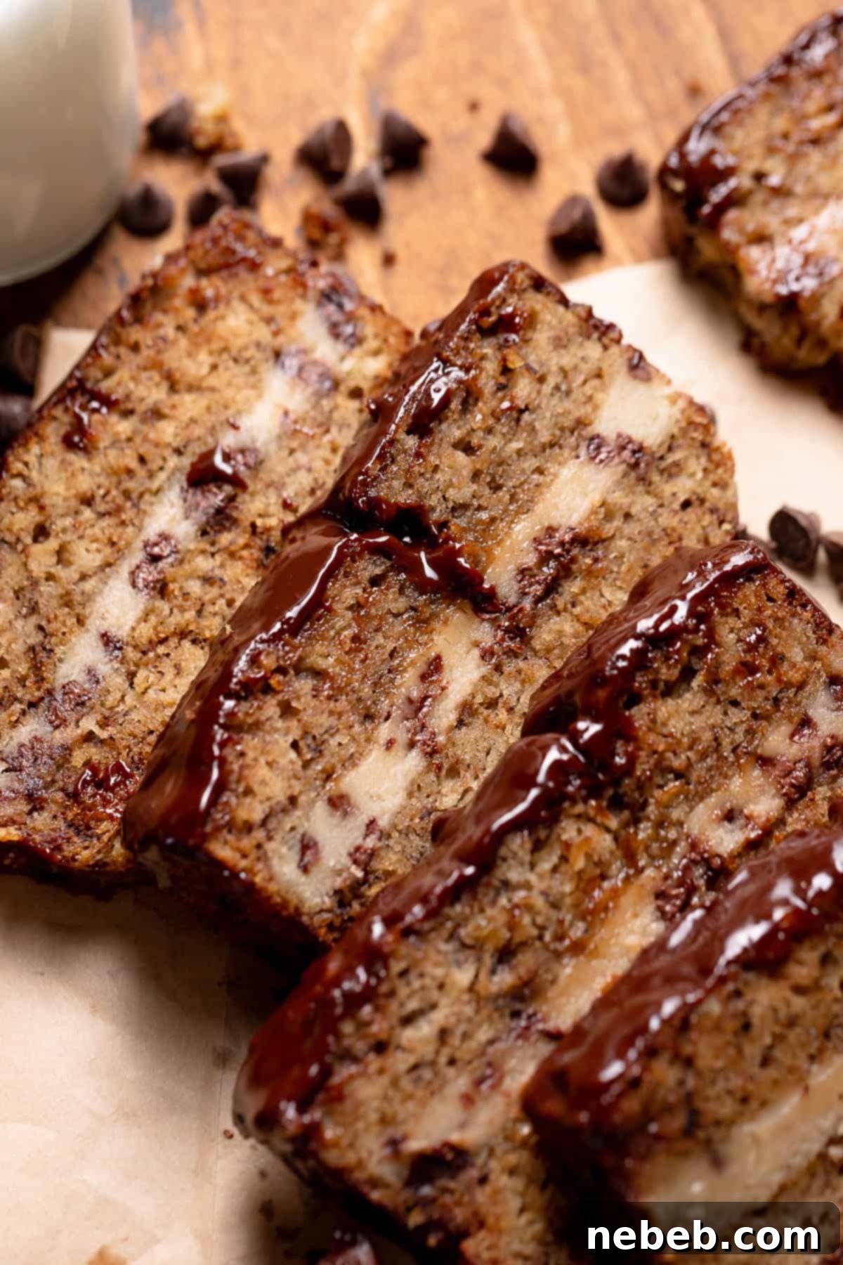 Slices of banana bread stuffed with chocolate chip cookie dough, revealing the gooey center.