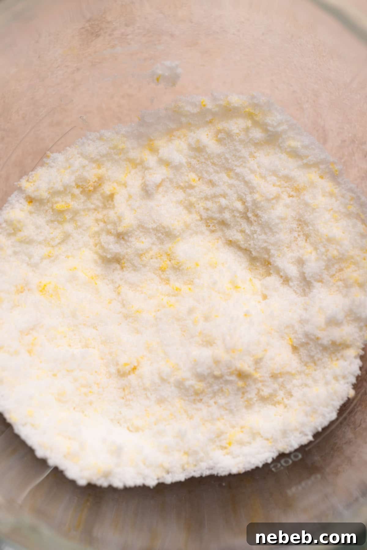 Lemon sugar in a mixing bowl.