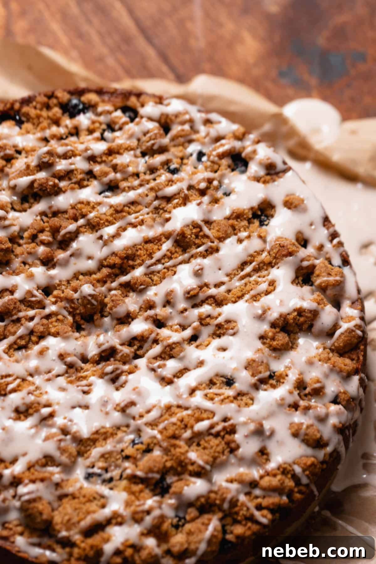 Luscious Blueberry Sour Cream Coffee Cake 10 Coffee cake drizzled with vanilla glaze on top.