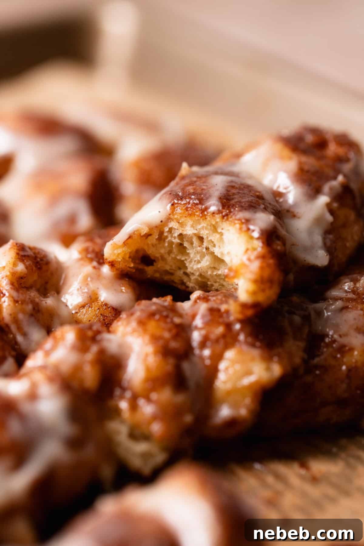 A cinnamon twist with a bite taken out of it.