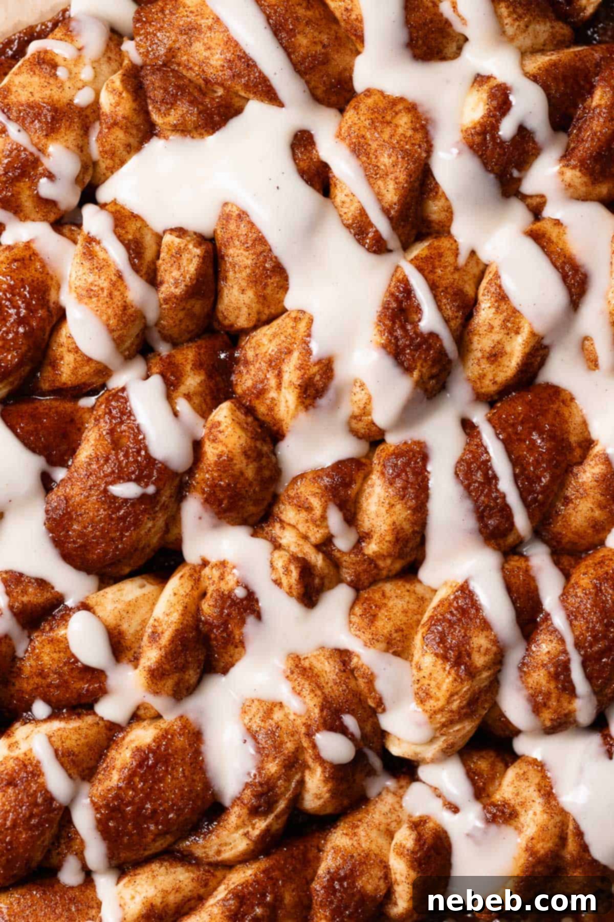Cinnamon roll twists drizzled with cream cheese icing.