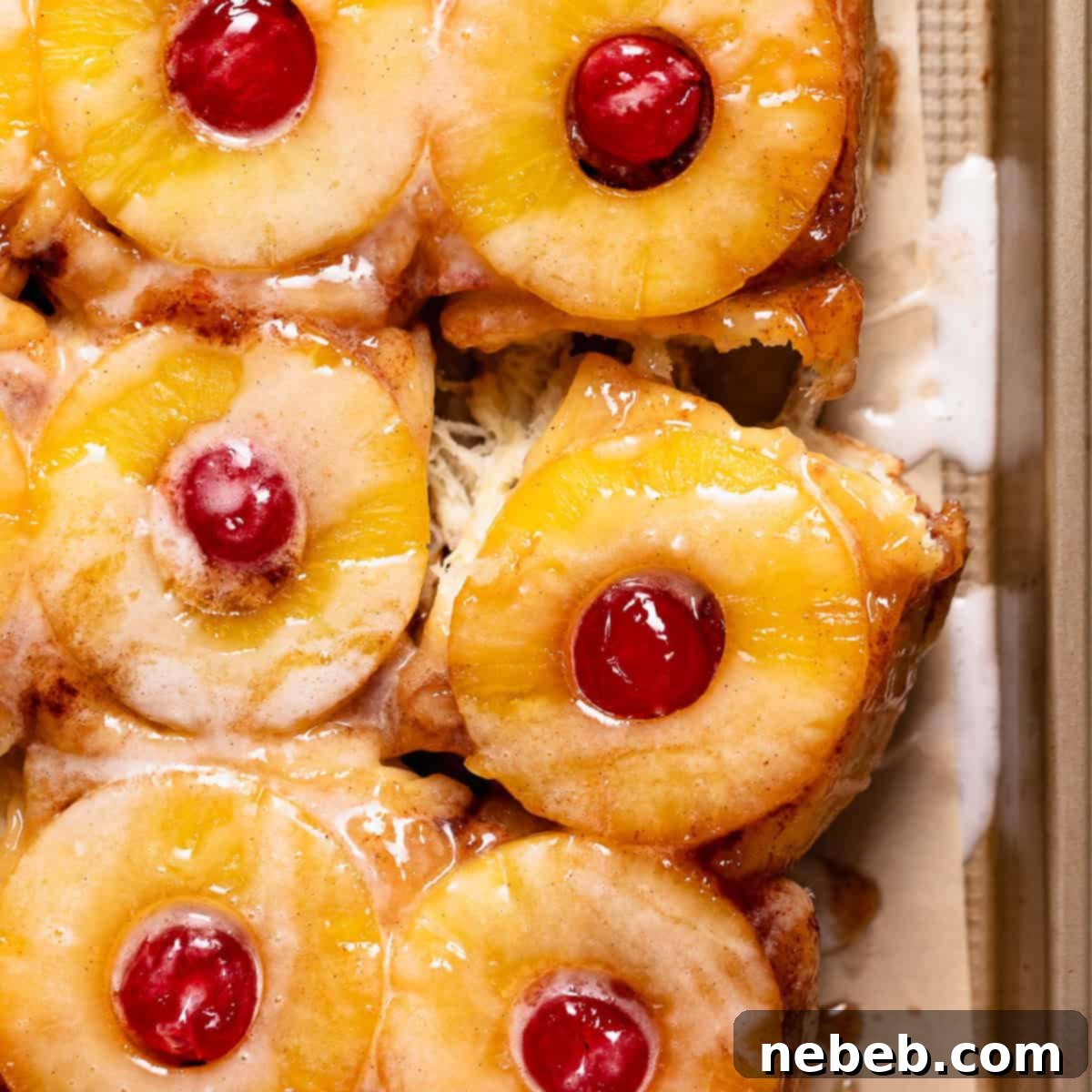 Pineapple rolls on a baking sheet.