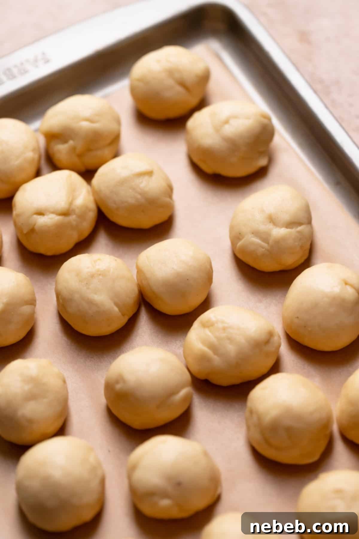 Cinnamon roll dough portioned into dough balls for the monkey bread.