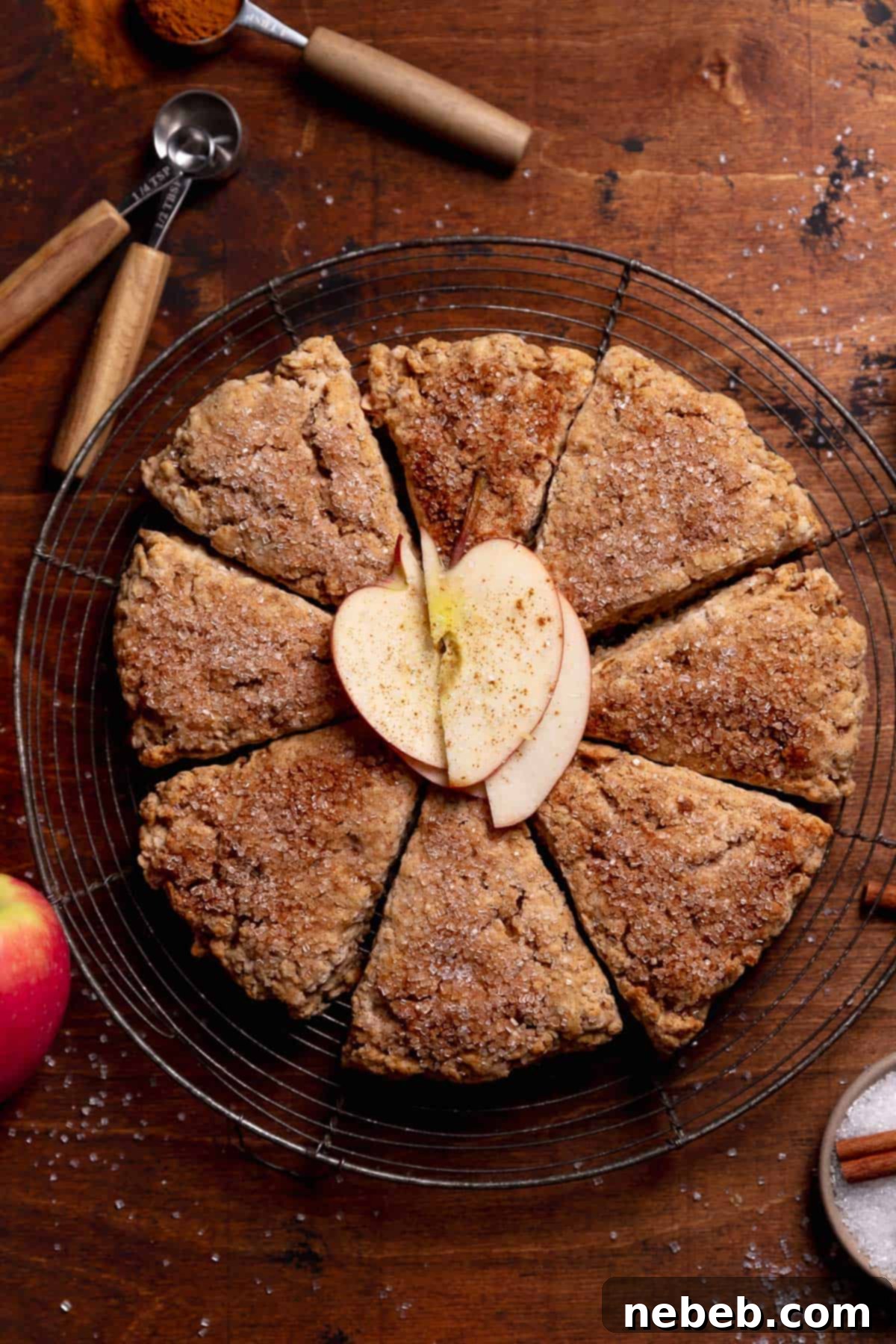 Cinnamon apple scones on a wire rack.