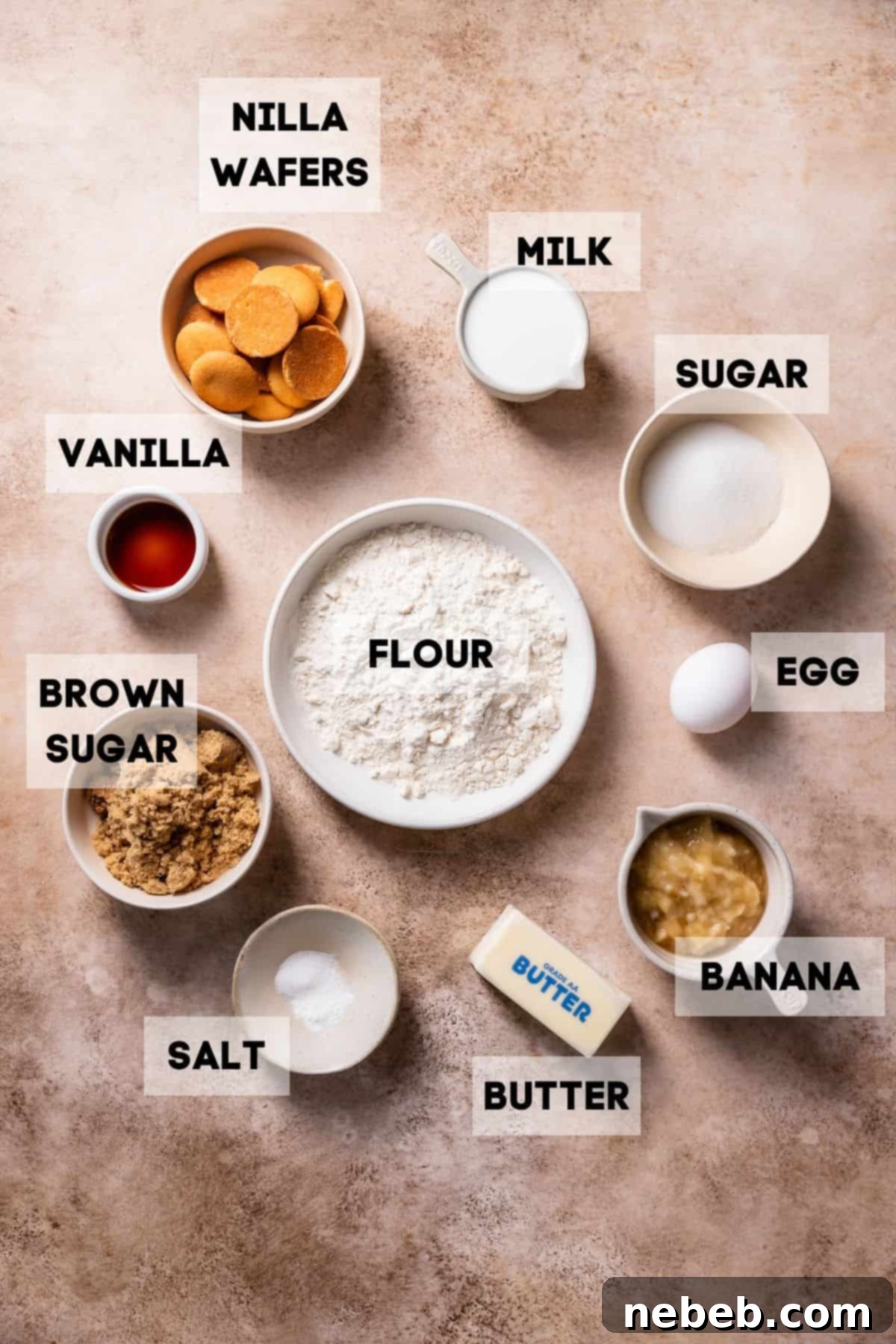 Ingredients needed to make pudding brownies in bowls with labels.