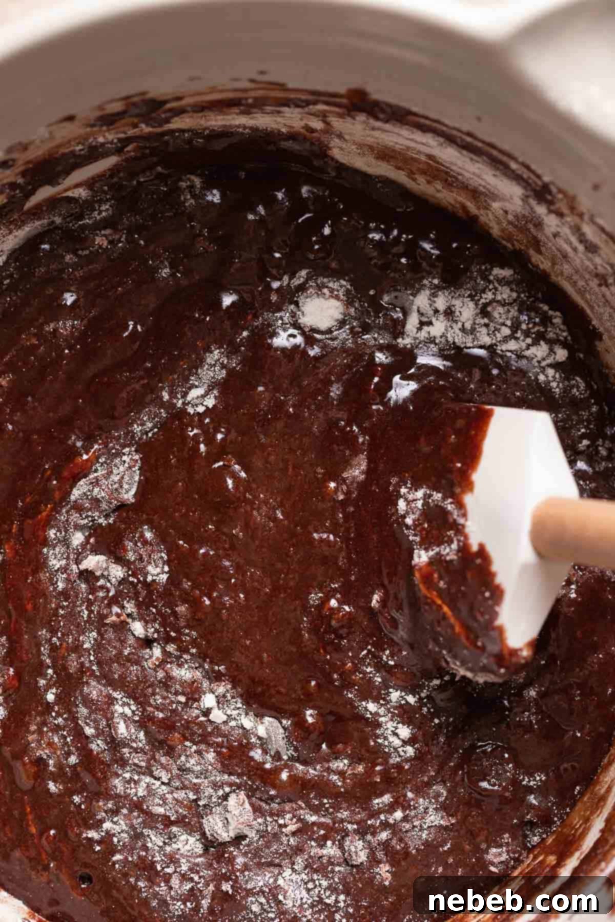 A mixing bowl of the brownie batter.