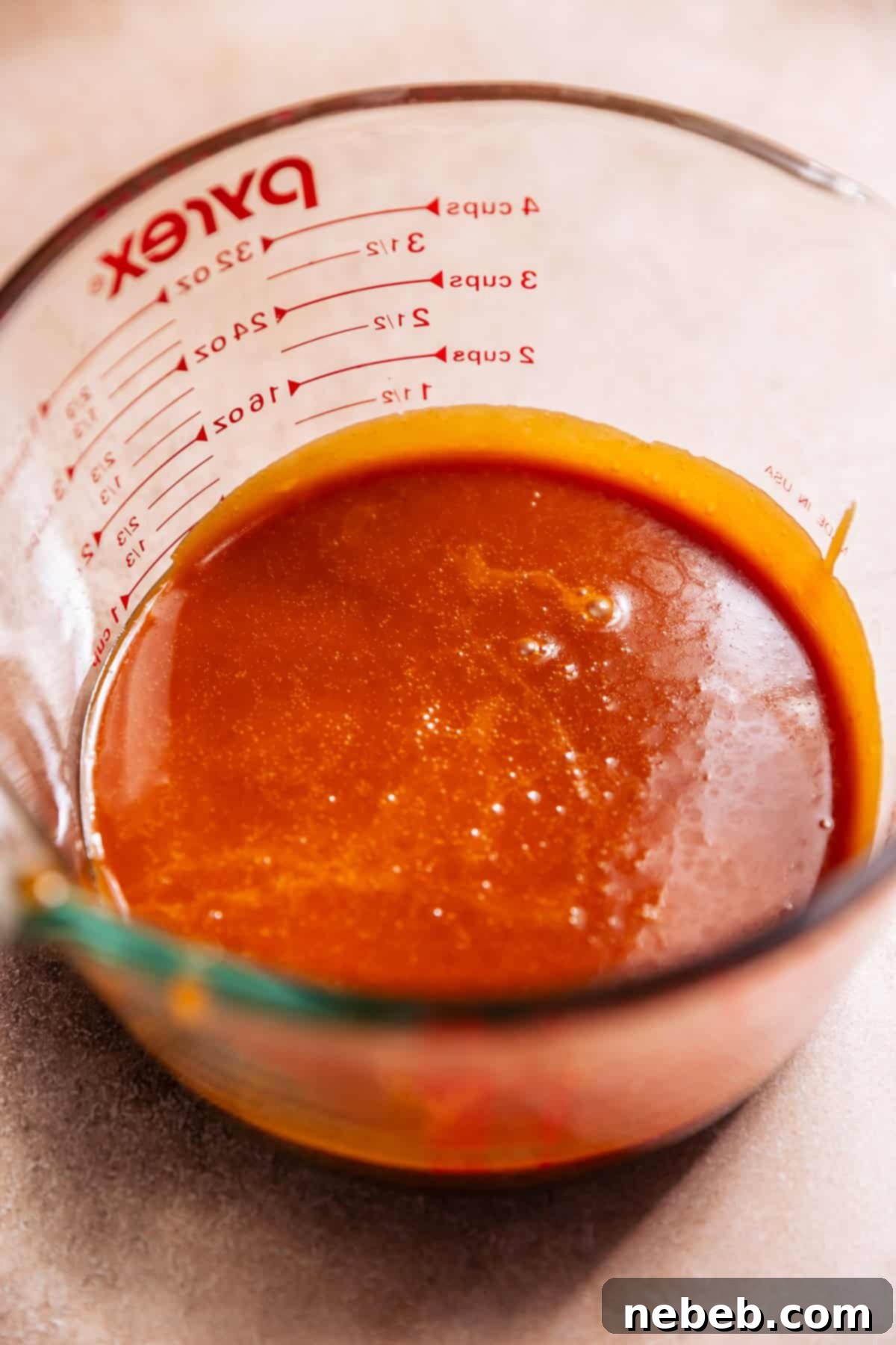 Glistening Salted Caramel Doughnuts 9 A glass mixing bowl of salted caramel.
