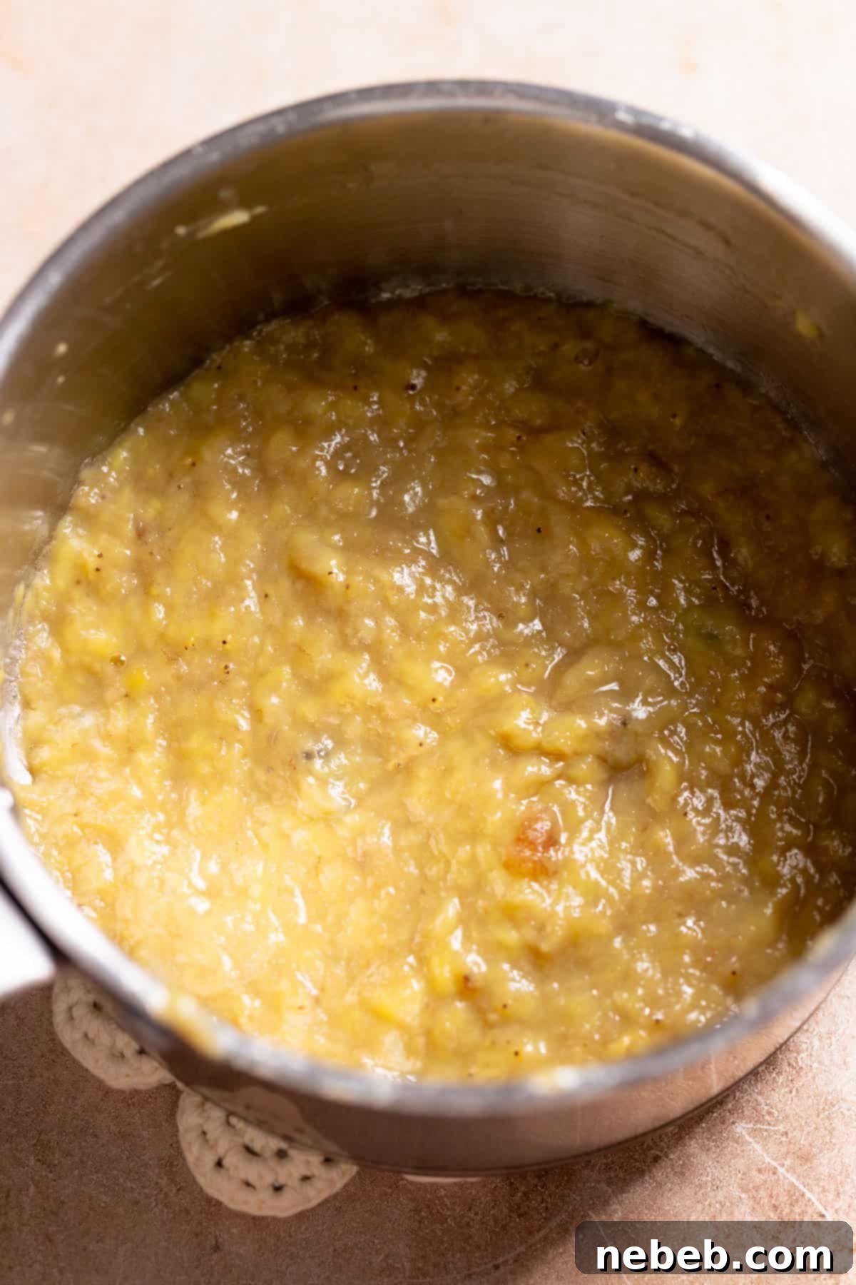 Banana Bread Cinnamon Rolls 3 Mashed ripe bananas cooked down in a saucepan.